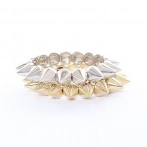 Pair Of Gold And Silver Studs And Spikes Bracelets