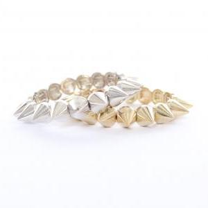 Pair Of Gold And Silver Studs And Spikes Bracelets